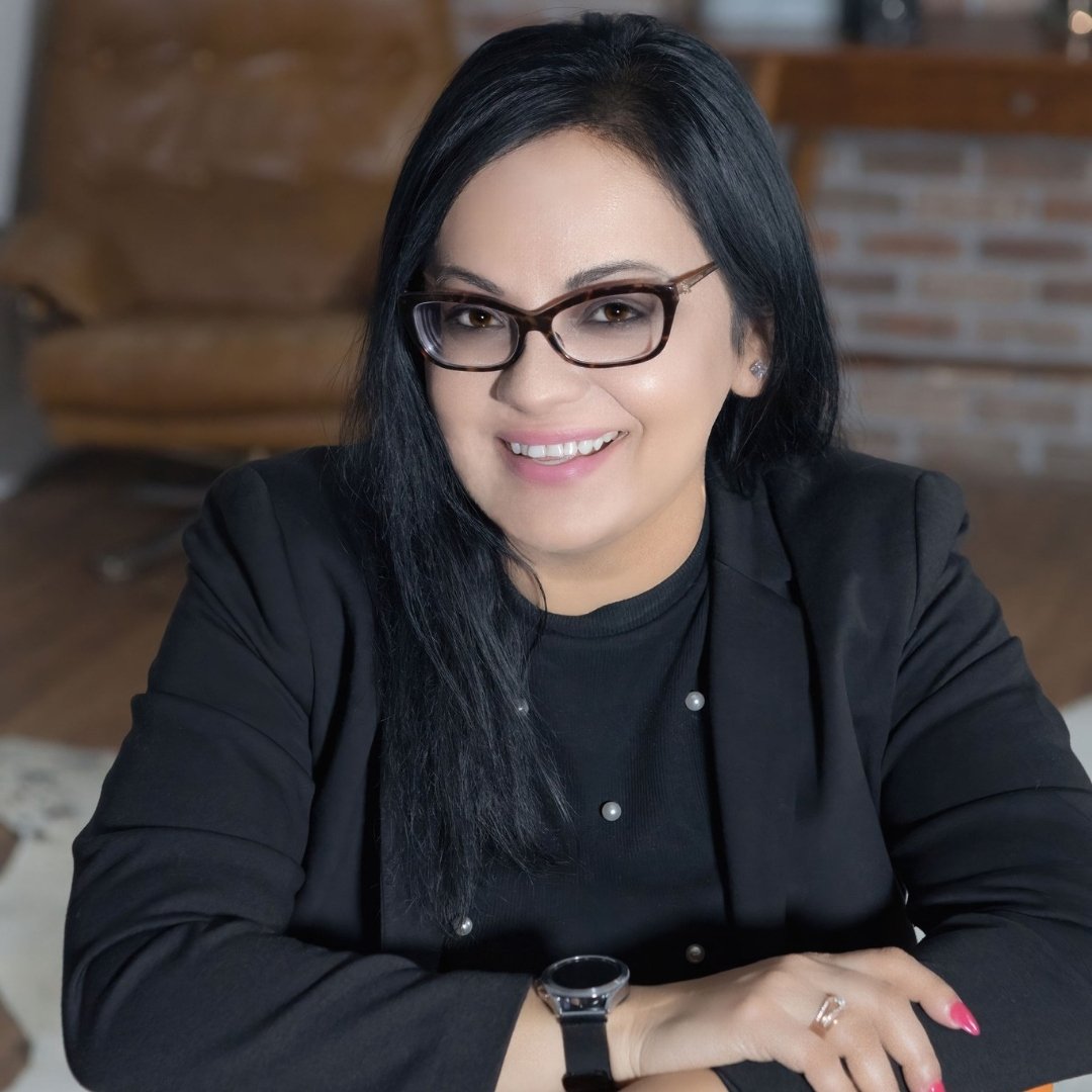 Amber Zain — Founder & CEO of Rising Above Inc.